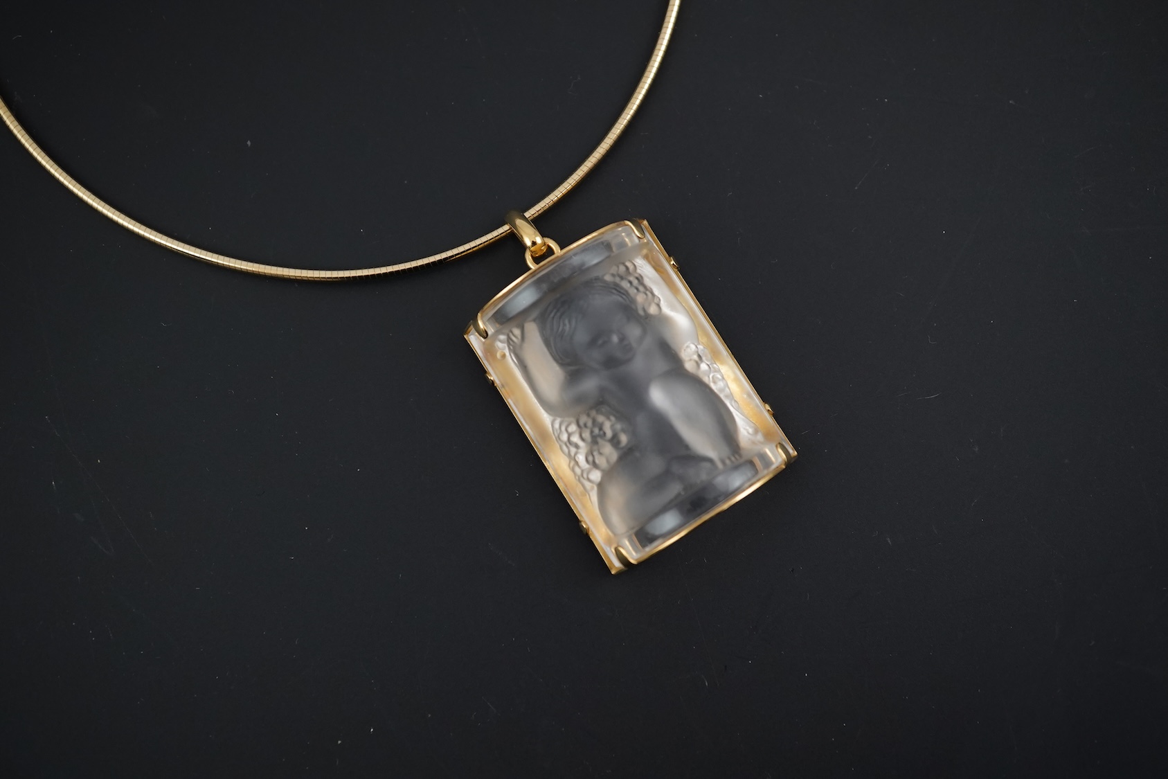 A Lalique Enfants pendant necklace, cased